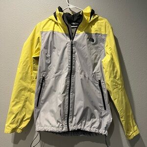 Yellow North face RainCoat Size Women’s XL, hood attached, mesh inner layer